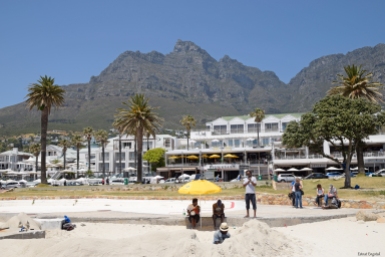 Camp's Bay beach seen from beach side with the mountains in the background, Cape Town.